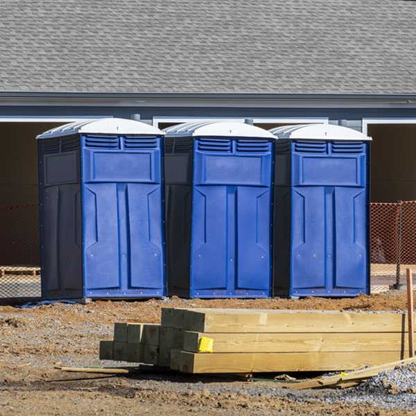 what is the cost difference between standard and deluxe portable toilet rentals in Cameron NC